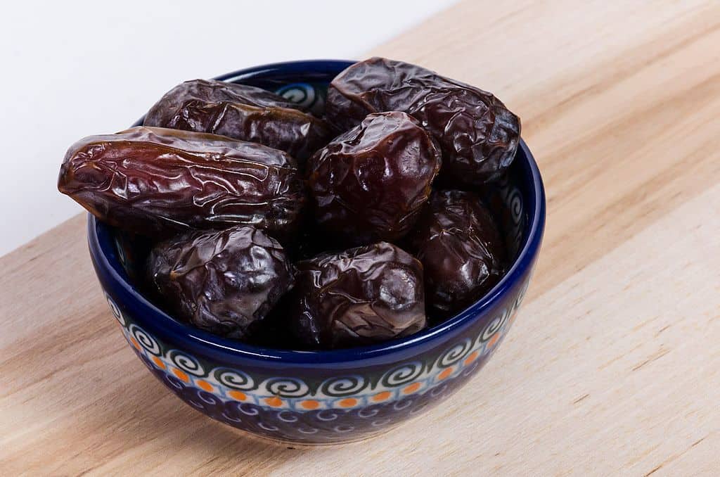 A bowl of dried dates. Can rabbits eat dates