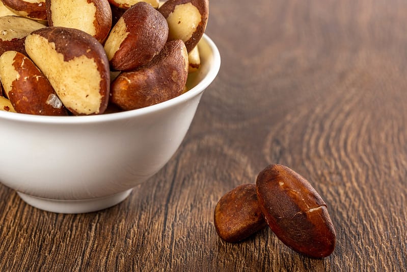 A bowl of raw brazil nuts. Can rabbits eat brazil nuts