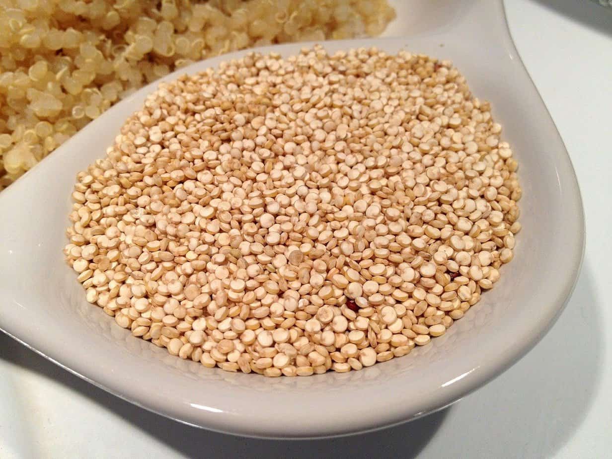 A bowl of uncooked quinoa. Can rabbits eat quinoa