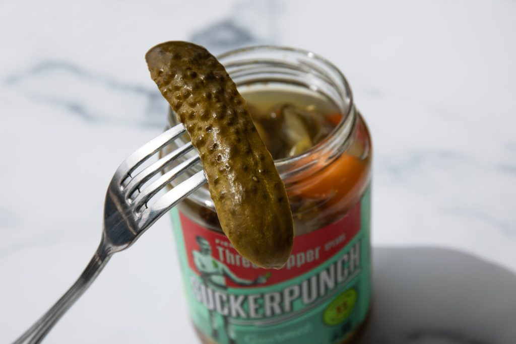 A pickles in a fork